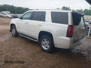 2015 Chevrolet Tahoe LTZ with VIN 1GNSCCKC1FR265370, listed as a IAAI auction lot 42131294 with 217,064 mi miles and . Bid and sale history available at DreamBid. Image 3.