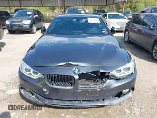 2015 BMW 4 Series 428i xDrive z VIN WBA3N5C55FK484938, wystawiony jako IAAI lot #41889907 z przebiegiem 100 439 mil mil oraz . Historia ofert i sprzedaży dostępna na DreamBid. Obrazek 12.