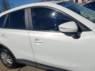 2016 Mazda CX-5 Sport with VIN JM3KE2BY9G0890587, listed as a IAAI auction lot 41685344 with 91,190 mi miles. Bid and sale history available at carsss.com. Image 13.