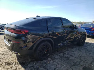 2023 BMW X6 xDrive40i z VIN 5UXCY6C04P9P46153, wystawiony jako Copart lot #81151634 z przebiegiem Nie podano mil oraz Szkoda całkowita • Salvage title. Historia ofert i sprzedaży dostępna na DreamBid. Obrazek 3.