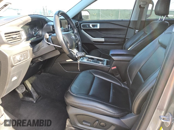 2022 Ford Explorer XLT with VIN 1FMSK8DH7NGA82496, listed as a Copart auction lot 51866865 with 77,014 mi miles and Clean Title. Bid and sale history available at carsss.com. Image 7.