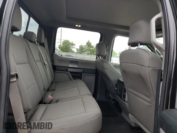 2015 Ford F-150 XLT with VIN 1FTEW1EP7FFC21309, listed as a Copart auction lot 55979265 with 86,484 mi miles and Salvage title. Bid and sale history available at DreamBid. Image 10.