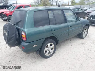 1999 Toyota RAV4 with VIN JT3GP10V0X7063505, listed as a IAAI auction lot 42052090 with 197,101 mi miles. Bid and sale history available at carsss.com. Image 4.
