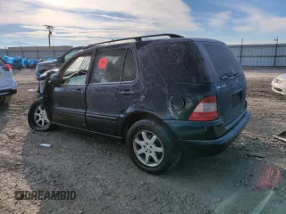 1999 Mercedes-Benz M 320/430/500 with VIN 4JGAB72E4XA096215, listed as a Copart auction lot 88049355 with Not provided miles and Salvage title. Bid and sale history available at DreamBid. Image 2.