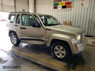 2010 Jeep Liberty Sport with VIN 1J4PN2GK9AW143878, listed as a Copart auction lot 52851095 with 121,357 mi miles and Salvage Title. Bid and sale history available at carsss.com. Image 4.