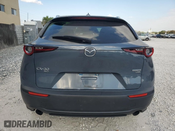 2021 Mazda CX-30 Premium with VIN 3MVDMBDY2MM306250, listed as a Copart auction lot 53430615 with 59,112 mi miles and Salvage title. Bid and sale history available at DreamBid. Image 6.
