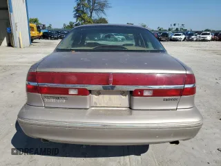1995 Lincoln Continental with VIN 1LNLM97V8SY681113, listed as a Copart auction lot 73695134 with 176,175 mi miles and Salvage Title. Bid and sale history available at carsss.com. Image 6.