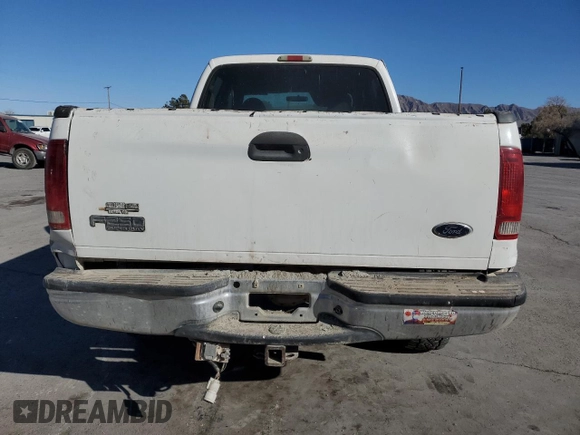 2001 Ford F-250 with VIN 3FTNW20S61MA46609, listed as a Copart auction lot 89076465 with 270,633 mi miles and Salvage title. Bid and sale history available at DreamBid. Image 6.