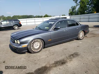 2004 Jaguar XJ with VIN SAJWA71CX4SG32785, listed as a Copart auction lot 69792134 with 183,705 mi miles and Non Repairable. Bid and sale history available at carsss.com. Image 1.
