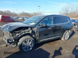 2023 Cadillac XT6 FWD Premium Luxury with VIN 1GYKPCRS1PZ105964, listed as a IAAI auction lot 41525039 with 70,603 mi miles and . Bid and sale history available at DreamBid. Image 19.