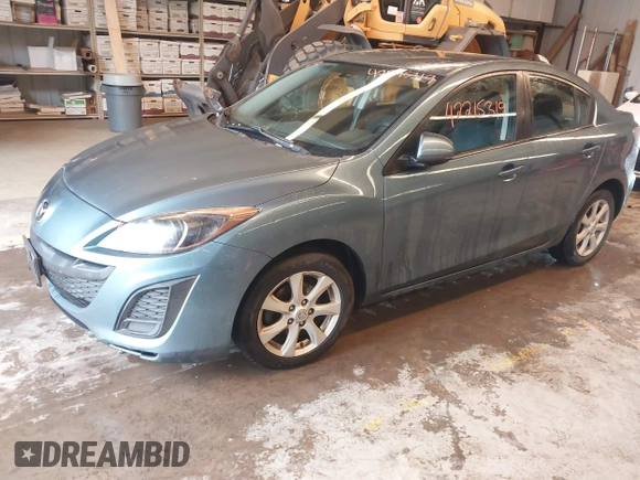 2011 Mazda 3 i Touring with VIN JM1BL1VGXB1360160, listed as a IAAI auction lot 42215319 with 161,993 mi miles and . Bid and sale history available at DreamBid. Image 2.