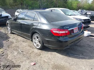 2013 Mercedes-Benz E-Class E 350 Luxury with VIN WDDHF5KB0DA702841, listed as a IAAI auction lot 41875593 with 276,264 mi miles. Bid and sale history available at carsss.com. Image 3.
