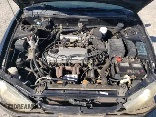 2002 Mitsubishi Mirage DE z VIN JA3AY11A02U013027, wystawiony jako Copart lot #73217194 z przebiegiem 155 865 mil mil oraz Szkoda całkowita • Salvage title. Historia ofert i sprzedaży dostępna na DreamBid. Obrazek 11.