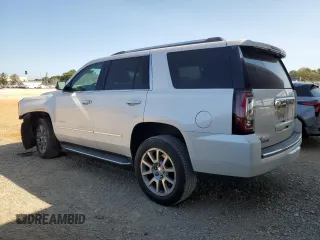 2020 GMC Yukon Denali with VIN 1GKS1CKJ6LR170901, listed as a Copart auction lot 76034594 with 118,738 mi miles and Salvage Title. Bid and sale history available at carsss.com. Image 2.