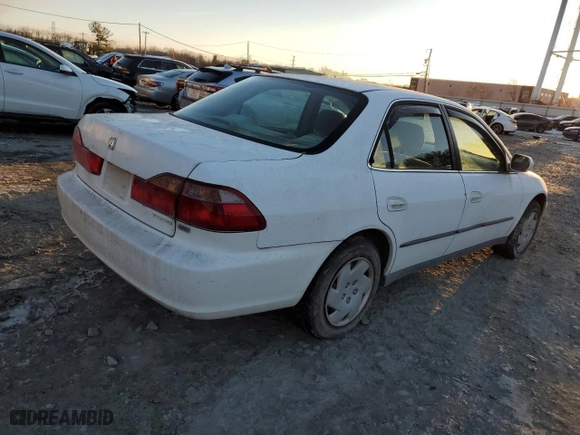 1999 Honda Accord Sdn LX with VIN 1HGCG1644XA068753, listed as a Copart auction lot 87135784 with 74,386 mi miles and Clean Title. Bid and sale history available at carsss.com. Image 3.