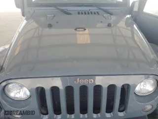 2015 Jeep Wrangler Sahara with VIN 1C4AJWBG9FL729104, listed as a Copart auction lot 51065615 with 216,779 mi miles and Clean Title. Bid and sale history available at carsss.com. Image 11.