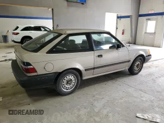 1990 Ford Escort z VIN 1FAPP9198LW113794, wystawiony jako Copart lot #48009265 z przebiegiem 67 809 mil mil oraz Czysty tytuł • Clean title. Historia ofert i sprzedaży dostępna na DreamBid. Obrazek 3.
