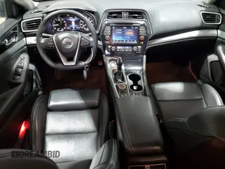 2017 Nissan Maxima SV z VIN 1N4AA6AP5HC388195, wystawiony jako Copart lot #57594715 z przebiegiem 35 760 mil mil oraz Szkoda całkowita • Salvage title. Historia ofert i sprzedaży dostępna na DreamBid. Obrazek 8.