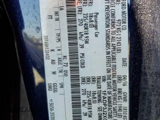 2016 Ford Focus Titanium z VIN 1FADP3J2XGL319399, wystawiony jako Copart lot #59258745 z przebiegiem 215 296 mil mil oraz Szkoda całkowita • Salvage title. Historia ofert i sprzedaży dostępna na DreamBid. Obrazek 12.