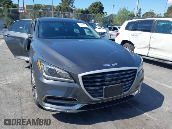 2018 Genesis G80 3.8L z VIN KMHGN4JEXJU283935, wystawiony jako IAAI lot #41750441 z przebiegiem 70 165 mil mil oraz . Historia ofert i sprzedaży dostępna na DreamBid. Obrazek 12.