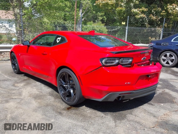 2020 Chevrolet Camaro 1LT with VIN 1G1FB1RX1L0113401, listed as a IAAI auction lot 42018427 with 61,603 mi miles and . Bid and sale history available at DreamBid. Image 3.