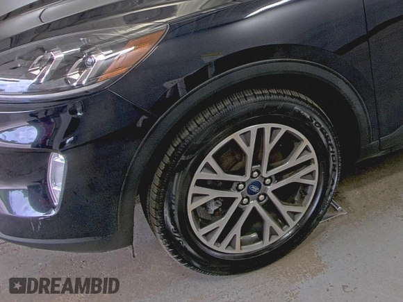 2021 Ford Escape SEL Hybrid with VIN 1FMCU9CZ0MUB25820, listed as a IAAI auction lot 42730204 with 66,443 mi miles and . Bid and sale history available at DreamBid. Image 6.