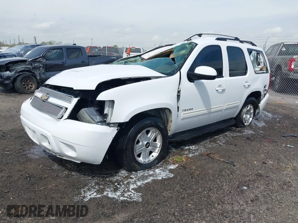 2011 Chevrolet Tahoe LS with VIN 1GNSCAE09BR352496, listed as a IAAI auction lot 41888764 with 234,311 mi miles and . Bid and sale history available at DreamBid. Image 2.