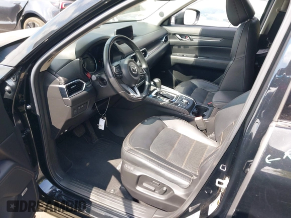 2020 Mazda CX-5 Grand Touring with VIN JM3KFADM3L1819939, listed as a IAAI auction lot 42749920 with 35,407 mi miles and . Bid and sale history available at DreamBid. Image 18.