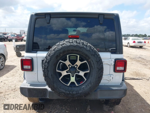 2018 Jeep Wrangler Unlimited Sport S z VIN 1C4HJXDG4JW298647, wystawiony jako IAAI lot #41930817 z przebiegiem 64 761 mil mil oraz . Historia ofert i sprzedaży dostępna na DreamBid. Obrazek 16.
