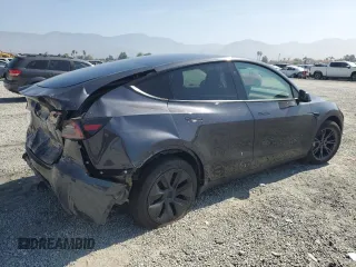 2024 Tesla Model Y Long Range z VIN 7SAYGDEE3RF121102, wystawiony jako Copart lot #60548895 z przebiegiem 13 336 mil mil oraz Szkoda całkowita • Salvage title. Historia ofert i sprzedaży dostępna na DreamBid. Obrazek 3.