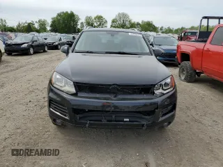 2012 Volkswagen Touareg Sport with VIN WVGFF9BP8CD001039, listed as a Copart auction lot 57764125 with 128,540 mi miles and Clean title. Bid and sale history available at DreamBid. Image 5.