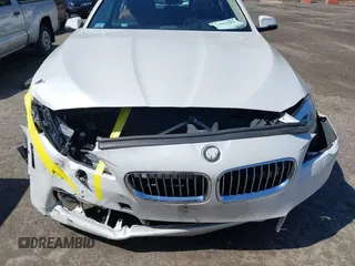 2015 BMW 5 Series 528i xDrive with VIN WBA5A7C54FD627334, listed as a IAAI auction lot 41904365 with 144,316 mi miles and . Bid and sale history available at DreamBid. Image 6.
