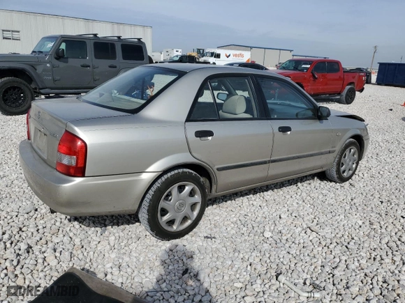 2003 Mazda Protege DX with VIN JM1BJ225131214875, listed as a Copart auction lot 82391834 with 126,680 mi miles and Salvage Title. Bid and sale history available at carsss.com. Image 3.