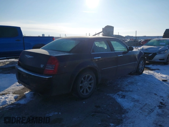 2005 Chrysler 300 with VIN 2C3AA63H65H526016, listed as a IAAI auction lot 41296420 with 136,794 mi miles. Bid and sale history available at carsss.com. Image 4.