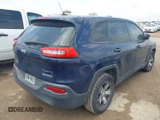 2014 Jeep Cherokee Sport with VIN 1C4PJLAB2EW279808, listed as a IAAI auction lot 42202402 with 98,671 mi miles and . Bid and sale history available at DreamBid. Image 4.