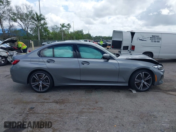 2023 BMW 3 Series 330i with VIN 3MW69FF00P8D61512, listed as a IAAI auction lot 41992509 with 15,809 mi miles and . Bid and sale history available at DreamBid. Image 13.
