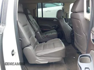 2015 GMC Yukon XL Denali with VIN 1GKS2JKJ2FR590502, listed as a IAAI auction lot 41758575 with 129,777 mi miles. Bid and sale history available at carsss.com. Image 8.