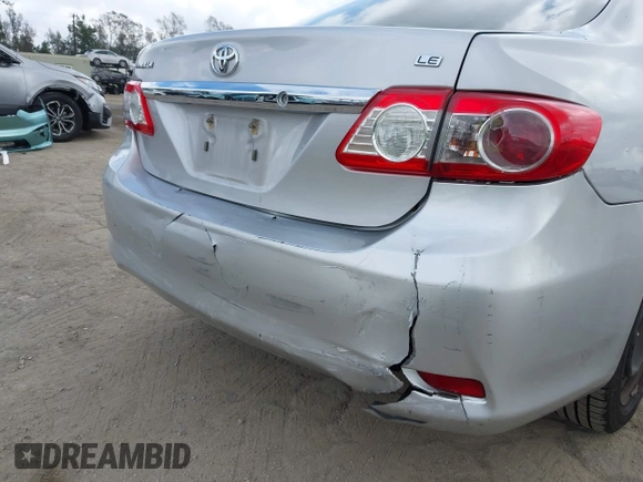 2012 Toyota Corolla L with VIN 2T1BU4EE9CC803165, listed as a IAAI auction lot 41924436 with 257,724 mi miles. Bid and sale history available at carsss.com. Image 18.
