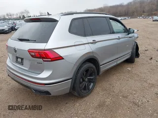 2023 Volkswagen Tiguan SE R-Line Black with VIN 3VV8B7AX3PM130610, listed as a IAAI auction lot 42011131 with 21,980 mi miles and . Bid and sale history available at DreamBid. Image 4.