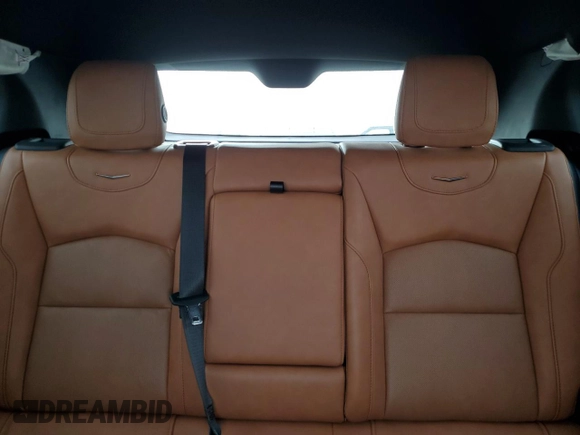 2024 Cadillac XT4 FWD Sport with VIN 1GYFZER46RF100076, listed as a Copart auction lot 45741285 with 11,616 mi miles and Salvage title. Bid and sale history available at DreamBid. Image 10.