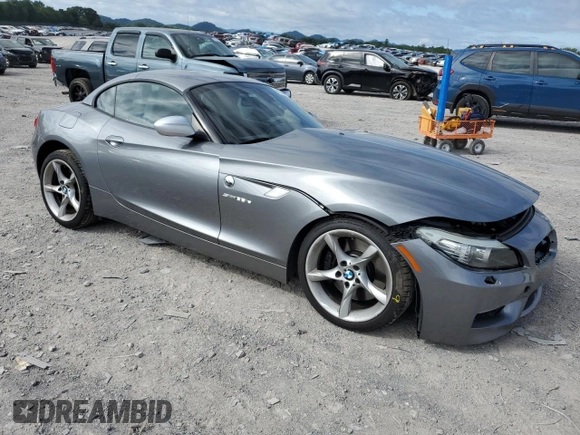 2011 BMW Z4 sDrive35is with VIN WBALM1C50BE633213, listed as a Copart auction lot 61220135 with 62,458 mi miles and Salvage title. Bid and sale history available at DreamBid. Image 4.