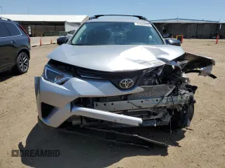 2017 Toyota RAV4 LE with VIN 2T3BFREV7HW561030, listed as a Copart auction lot 61284245 with 90,690 mi miles and Salvage title. Bid and sale history available at DreamBid. Image 5.
