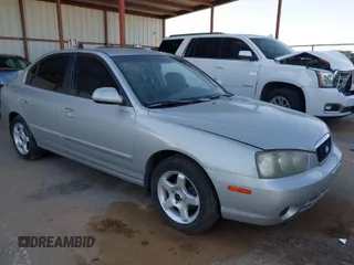 2003 Hyundai Elantra GLS z VIN KMHDN45D43U552485, wystawiony jako IAAI lot #41680449 z przebiegiem 127 899 mil mil oraz . Historia ofert i sprzedaży dostępna na DreamBid. Obrazek 1.