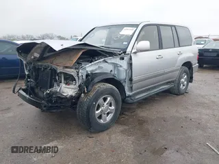 2002 Toyota Land Cruiser with VIN JTEHT05J322029734, listed as a IAAI auction lot 41953160 with 327,101 mi miles. Bid and sale history available at carsss.com. Image 2.