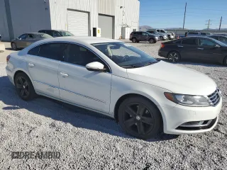 2017 Volkswagen CC Sport with VIN WVWKP7ANXHE503928, listed as a Copart auction lot 71029924 with 105,290 mi miles and Salvage Title. Bid and sale history available at DreamBid. Image 4.