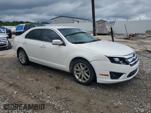 2012 Ford Fusion SEL with VIN 3FAHP0JA0CR249382, listed as a Copart auction lot 61173215 with 220,214 mi miles and Salvage title. Bid and sale history available at DreamBid. Image 4.