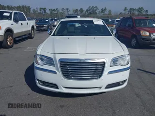 2013 Chrysler 300 Luxury Series with VIN 2C3CCASGXDH573689, listed as a IAAI auction lot 41782712 with 204,746 mi miles and . Bid and sale history available at DreamBid. Image 13.