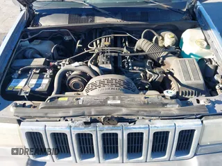 1996 Jeep Grand Cherokee Laredo with VIN 1J4FX58S8TC169575, listed as a IAAI auction lot 40971134 with 152,116 mi miles. Bid and sale history available at carsss.com. Image 10.