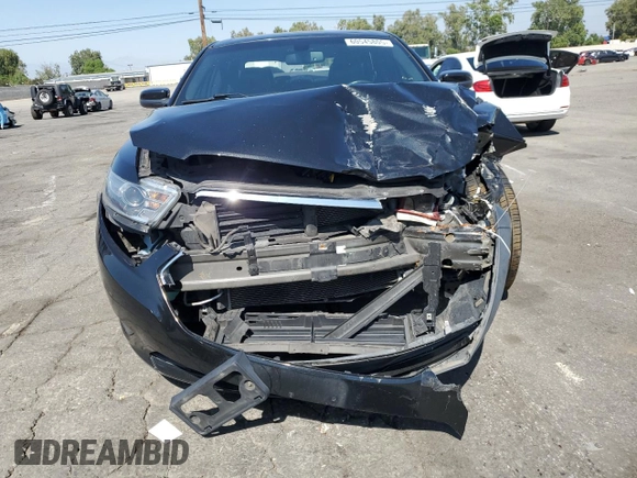 2015 Ford Taurus SEL with VIN 1FAHP2E86FG130511, listed as a Copart auction lot 60545805 with 99,215 mi miles and Salvage title. Bid and sale history available at DreamBid. Image 5.