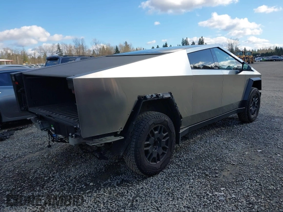 2024 Tesla Cybertruck with VIN 7G2CEHED8RA015749, listed as a IAAI auction lot 41731902 with 13,822 mi miles. Bid and sale history available at carsss.com. Image 4.